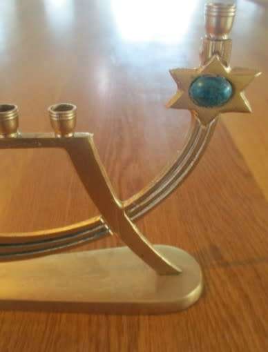 A small vintage Hanukkah Menorah made in Israel - 9 candles
