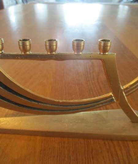 A small vintage Hanukkah Menorah made in Israel - 9 candles