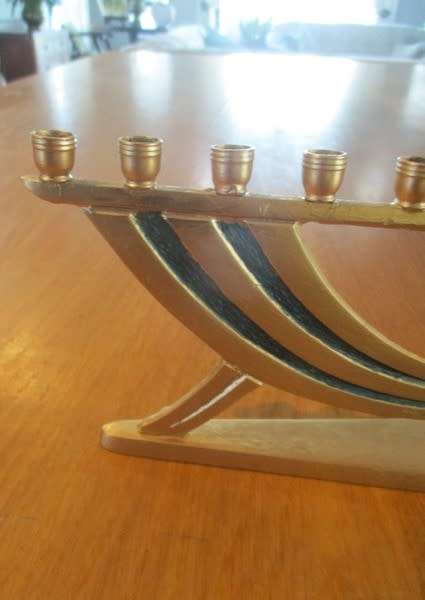A small vintage Hanukkah Menorah made in Israel - 9 candles