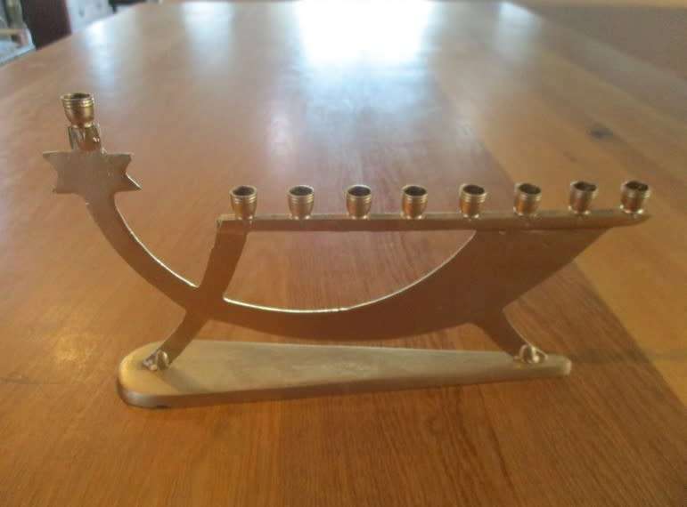 A small vintage Hanukkah Menorah made in Israel - 9 candles