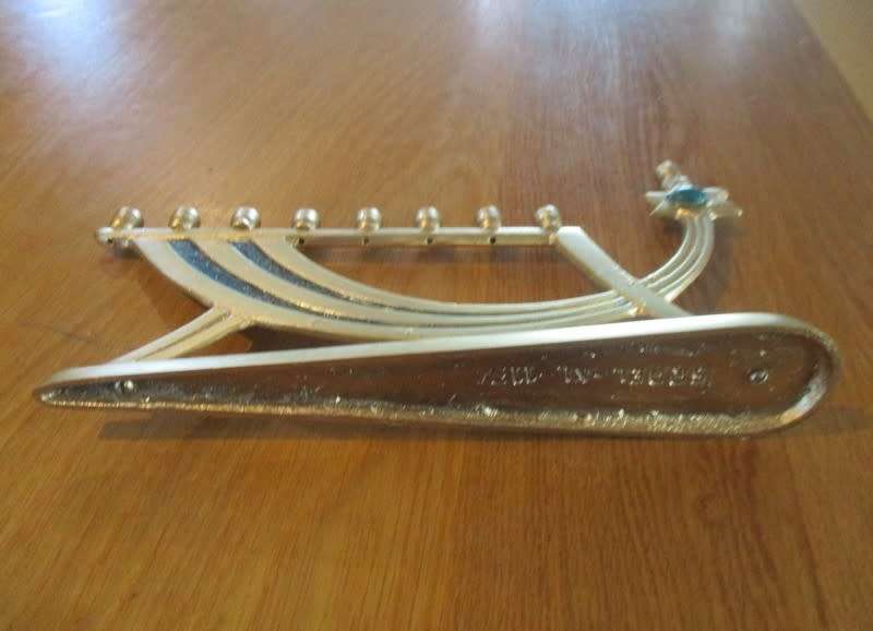 A small vintage Hanukkah Menorah made in Israel - 9 candles