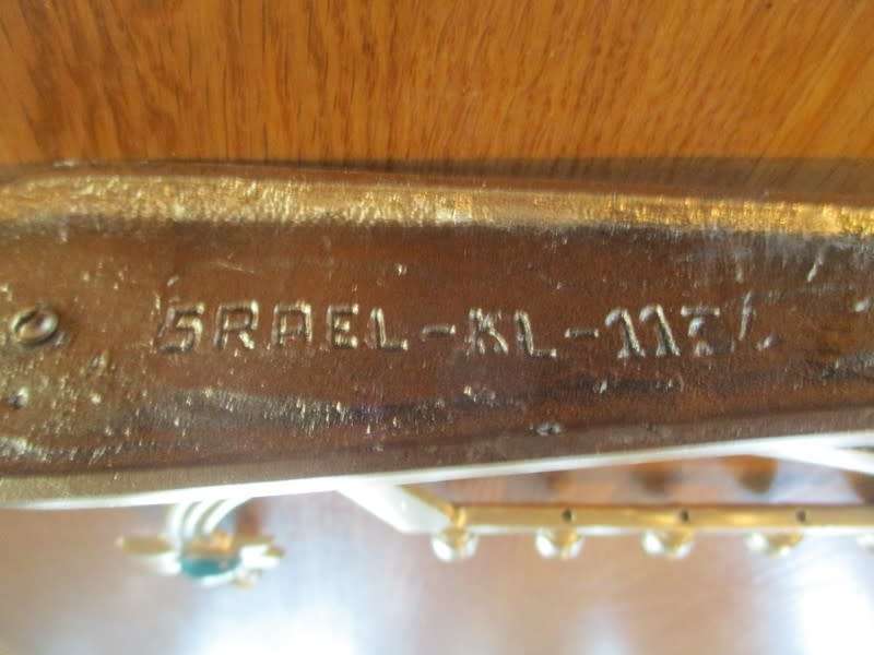 A small vintage Hanukkah Menorah made in Israel - 9 candles