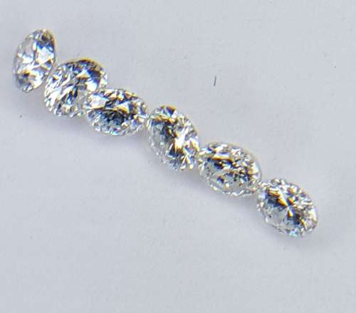 Six  (+\-) 0.05 pointers round brilliant cut diamonds Colour ( H) not graded One diamond per bid