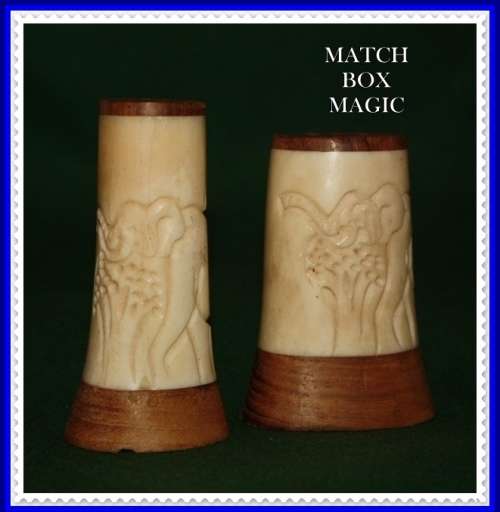 VINTAGE BONE AND WOOD SALT AND PEPPER SET ENGRAVED WITH AN ELEPHANT MOTIF