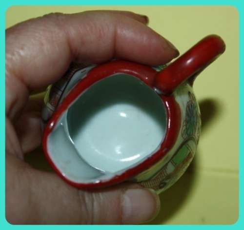 SMALL ORIENTAL JUG WITH LOVELY HOME THEME