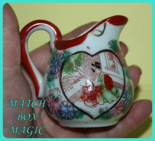SMALL ORIENTAL JUG WITH LOVELY HOME THEME