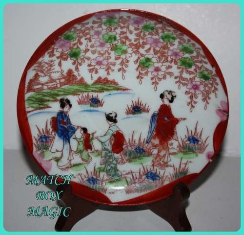 LOVELY ORIENTAL SAUCER WITH A GARDEN THEME