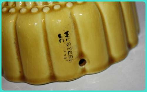 JELLY MOULD CERAMIC YELLOW DECORATIVE MAKERS NAME ON SIDE CAN BE DISPLAYED ON WALL
