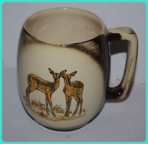 VINTAGE KRUGER PARK SOUVENIR MUG DEPICTING TO IMPALA MARKED UNDERNEATH A37 KRUGER PARK