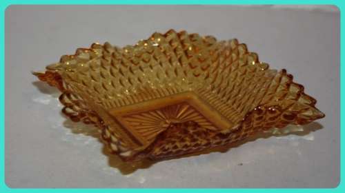 SMALL AMBER COLORED FRILLED TRINKET DISH