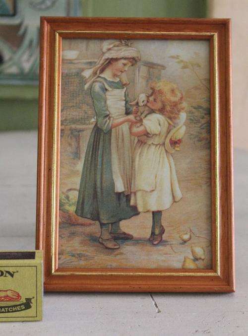PICTURE OF TWO GIRLS IN FARMYARD IN WOOD FRAME