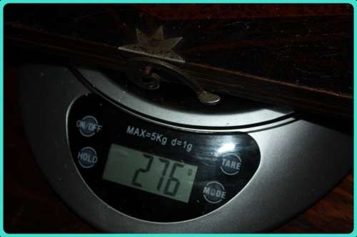 OLD WOODEN  PRESS WITH UNUSUAL CLASP