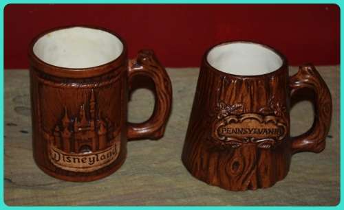 TWO AMERICAN SOUVENIR TANKARDS DISNEYLAND AND PENNSYLVANIA BROWN WOOD FINISH