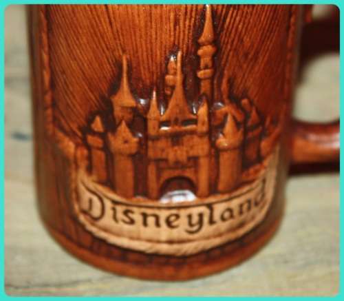 TWO AMERICAN SOUVENIR TANKARDS DISNEYLAND AND PENNSYLVANIA BROWN WOOD FINISH