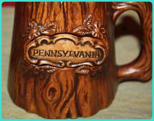 TWO AMERICAN SOUVENIR TANKARDS DISNEYLAND AND PENNSYLVANIA BROWN WOOD FINISH