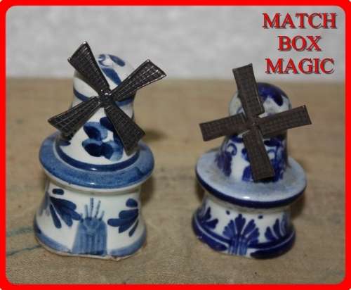 TWO SMALL DUTCH WINDMILLS BLUE AND WHITE METAL BLADES TURN