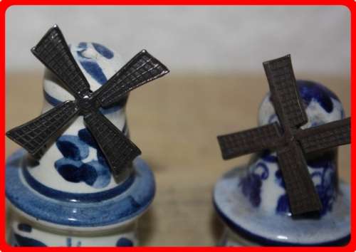 TWO SMALL DUTCH WINDMILLS BLUE AND WHITE METAL BLADES TURN