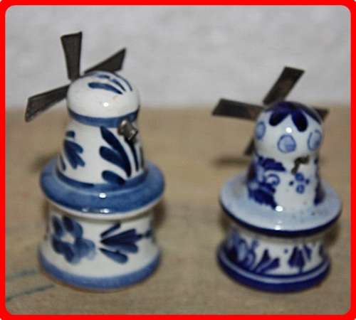TWO SMALL DUTCH WINDMILLS BLUE AND WHITE METAL BLADES TURN