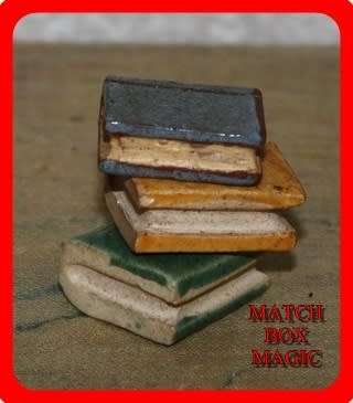 LOVELY TRIO OF POTTERY BOOKS MINIATURE LENGTH OF YELLOW 3CM WIDTH  1 CM