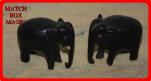 TWO SMALL WOODEN ELEPHANTS  HEIGHT 4CM LENGTH 5CM