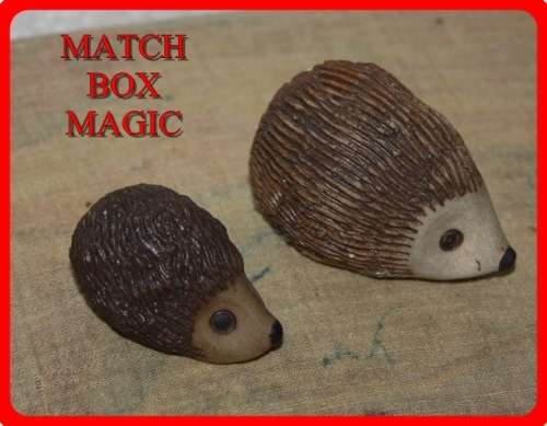 NICLEY MADE PAIR OF POTTERY HEDGEHOGS