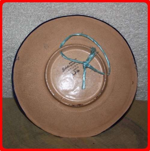 VINTAGE HAND PAINTED FLORAL WALL PLATE FROM PORTUGAL  STAMPED ON BACK