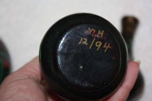 TRIO OF BEAUTIFULLY HAND PAINTED VASES BLACK BACKGROUND WITH PAISLEY FLORAL AND GOLD TRIM FOREGROUND