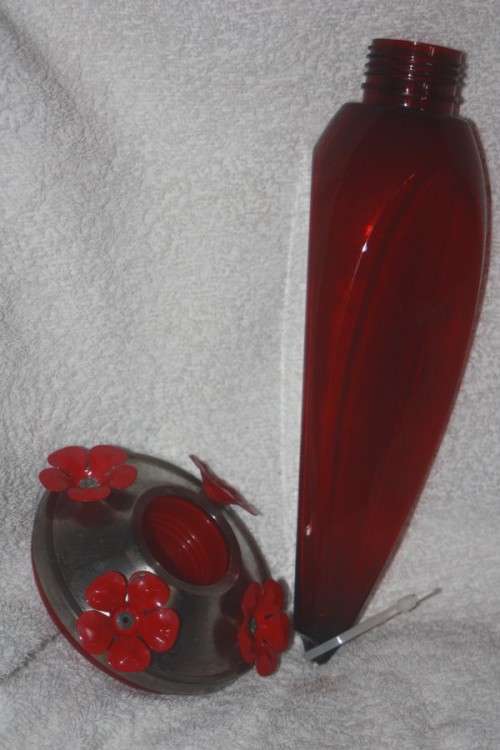 HONEY SUCKER SYRUP BIRD FEEDER RED IN COLOUR