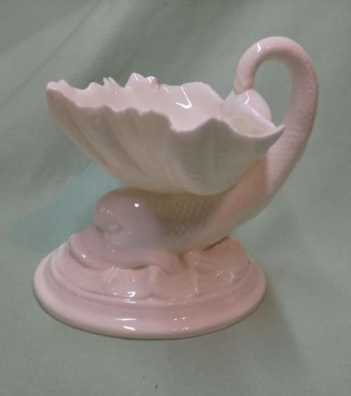 Royal Wocester dolphin supporting a clam shell ornament