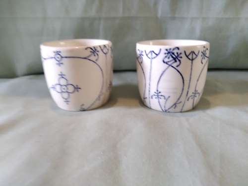 Pair of blue and white straw pattern Polish egg cups attributed toJaworzyna Slaska (Konigszelt)
