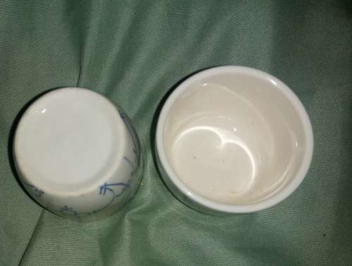 Pair of blue and white straw pattern Polish egg cups attributed toJaworzyna Slaska (Konigszelt)