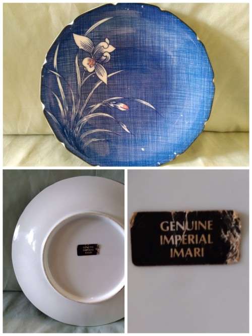 Genuine imperial  Imari plate. Blue background with stylized daffodils