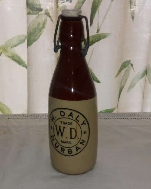 Antique W. Daly, Durban ceramic ginger beer bottle with lid