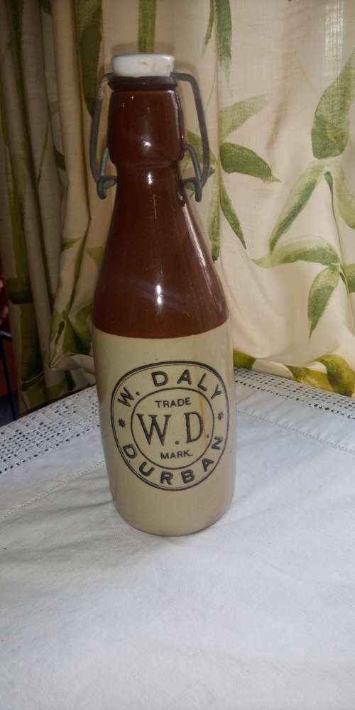 Antique W. Daly, Durban ceramic ginger beer bottle with lid