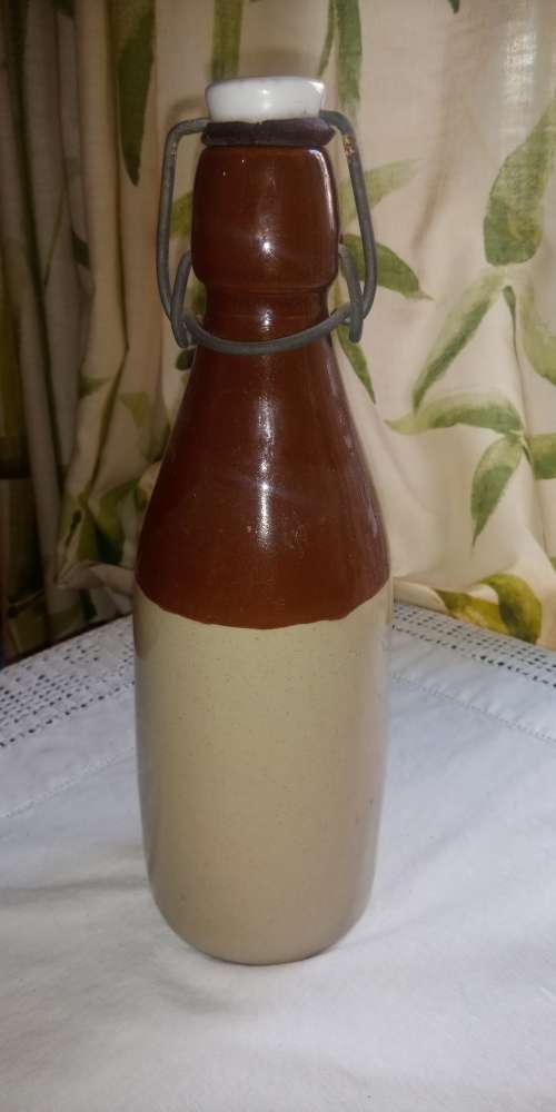 Antique W. Daly, Durban ceramic ginger beer bottle with lid