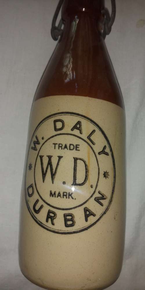 Antique W. Daly, Durban ceramic ginger beer bottle with lid