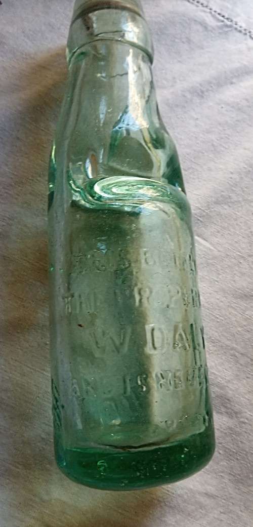 Antique W. Daly, Durban glass  bottle with marble stopper