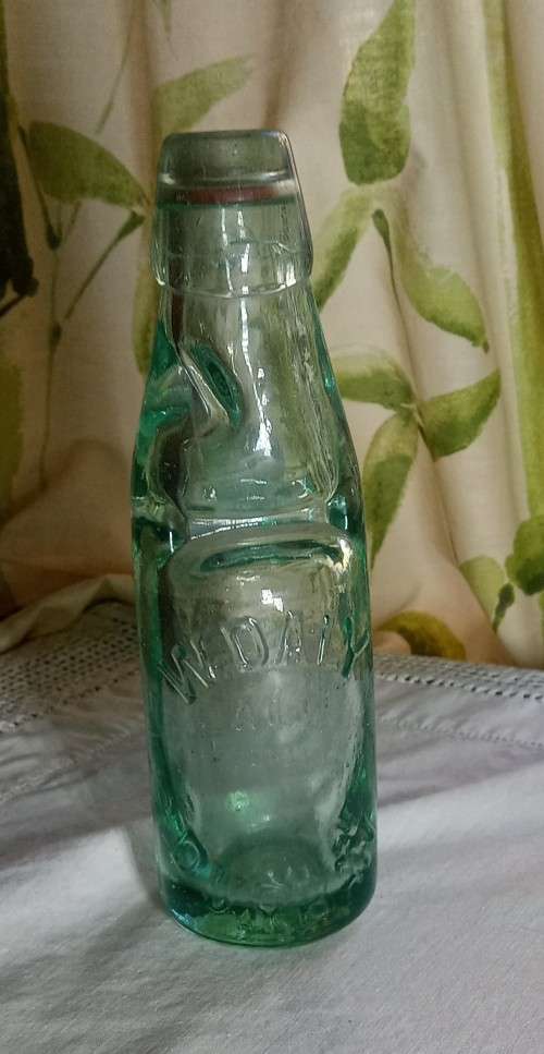 Antique W. Daly, Durban glass  bottle with marble stopper