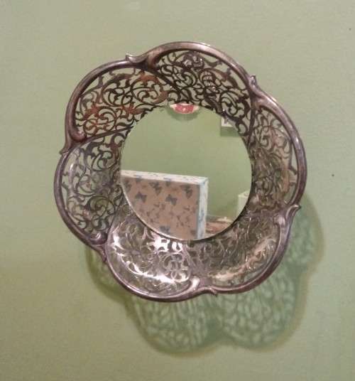 Repurposed vintage. Decorative mirror from epns frett work bowl.