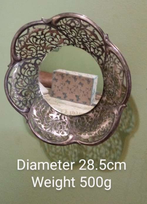 Repurposed vintage. Decorative mirror from epns frett work bowl.