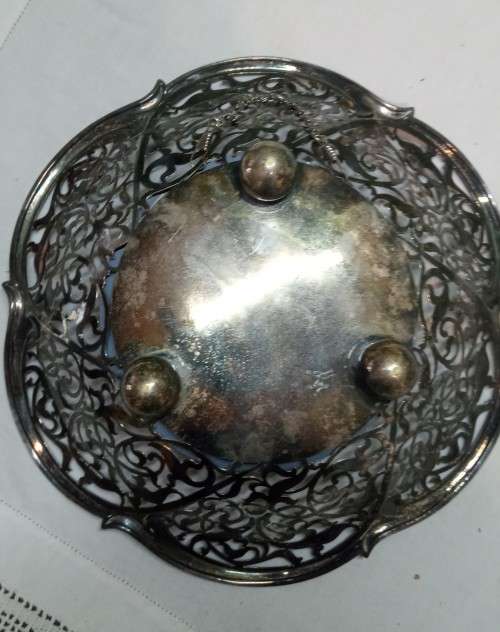 Repurposed vintage. Decorative mirror from epns frett work bowl.