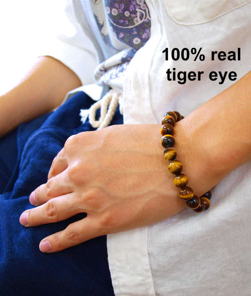 100% real golden tiger eye gemstone. Feng Shui healing benefits, 8mm bracelet. Good fortune.
