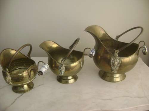 3 VINTAGE BRASS COAL SHUTTLES WITH PORCELAIN HANDLES (SOLD TOGETHER AS ONE LOT)