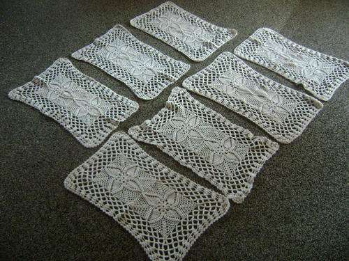HAND CROCHET ITEMS:-  7 MATCHING CROCHET CLOTHS (EACH MEASURING 58 CM X 36 CM)