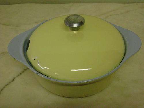 VINTAGE BLUE AND YELLOW ENAMEL ON CAST IRON POT WITH LID