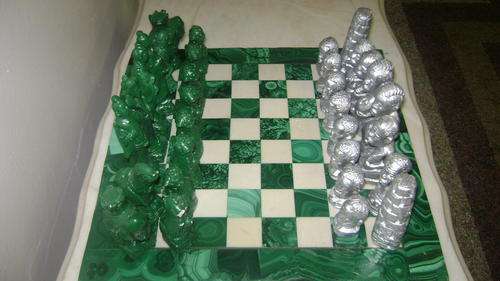 Chess Set - African vs Chinese figurines on Verdite board - very nice