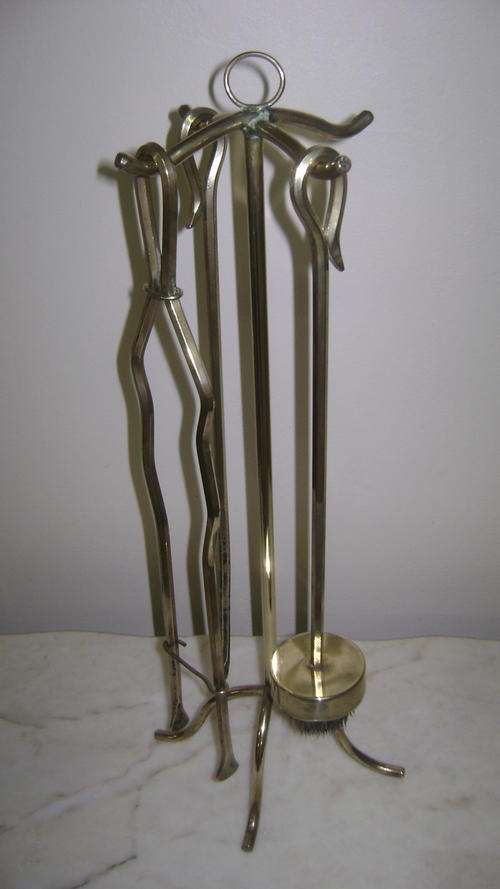 Brass fire utensils on stand