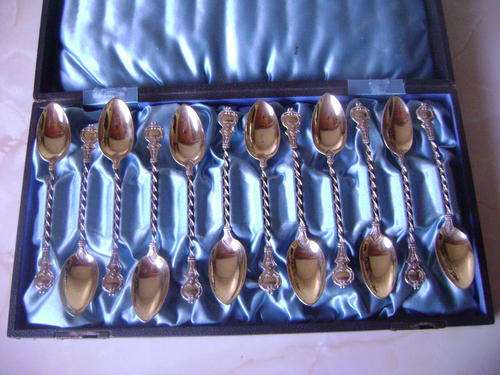 12 Silver-gilt teaspoons with twisted handles in original box - Hallmarked- ? German -lovely item!!!