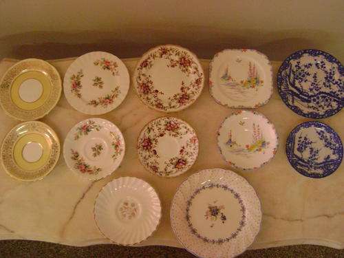 For the wall plate collector - 12 lovely small plates and saucers all in perfect condition