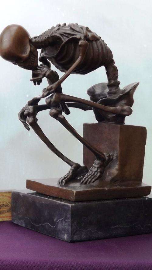 BRONZE SEATED SKELETON AFTER RODIN'S "THE THINKER"